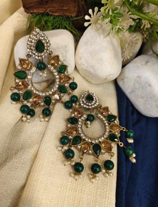 Sona polish earing in golden with green pearl