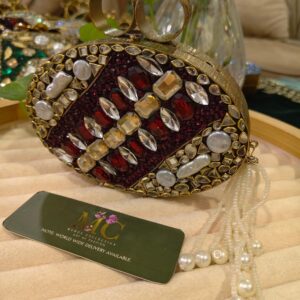 The swarovski kundan clutch