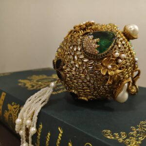 Spherical Kundan Tassel Clutch